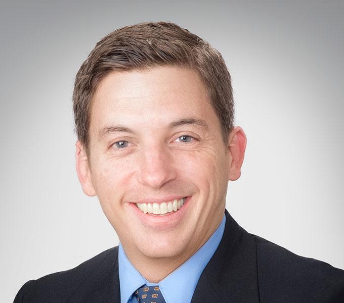 Headshot of Adam Olsen